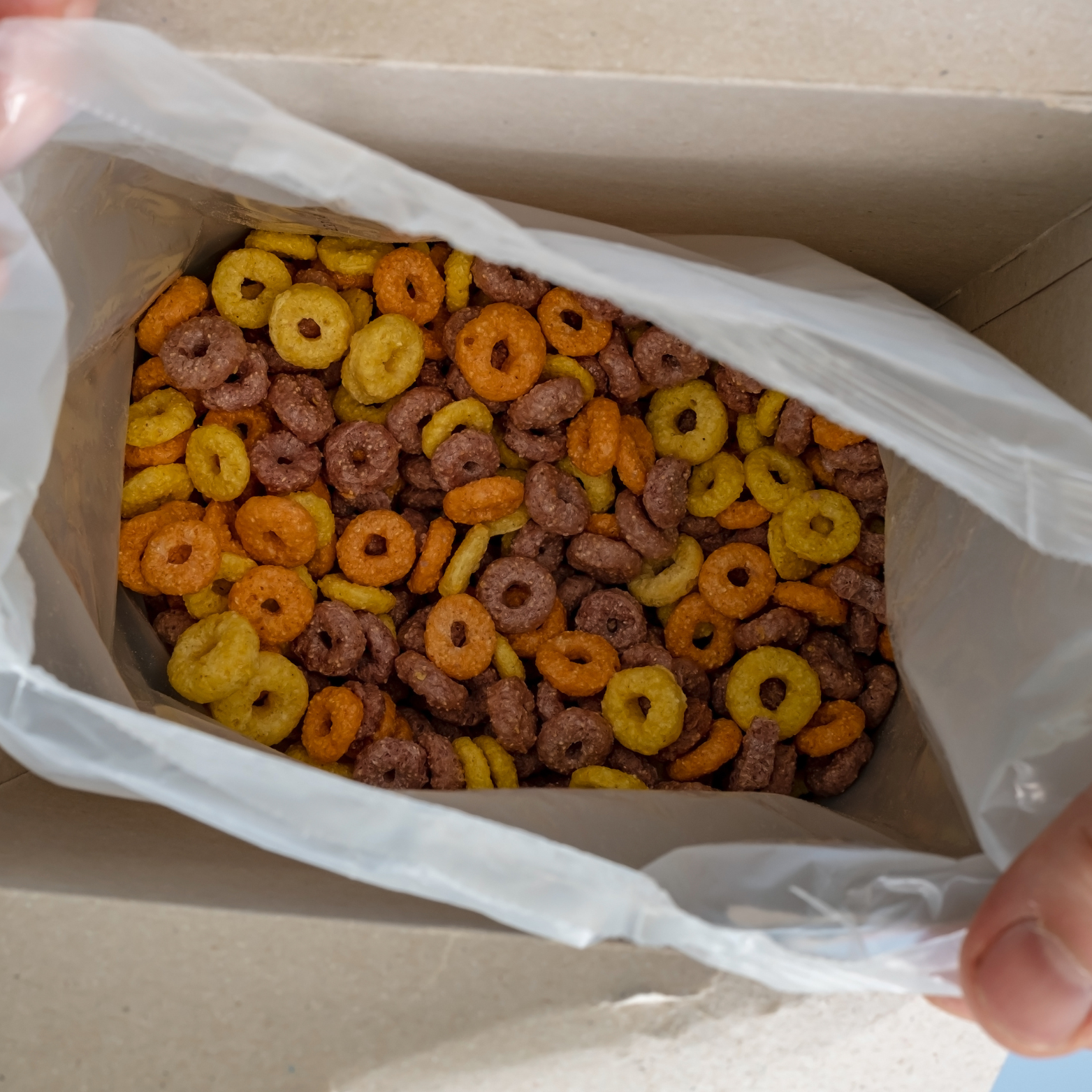 Materials: Cardboard: Rigid and sturdy to protect the cereal from damage and preserve freshness. Options include printed and plain finishes. Paperboard: Lightweight but durable, suitable for retail display and shelf stability. Food-Grade Linings: Inner coatings to protect against moisture and maintain product freshness. Customization: Sizes: Various sizes to accommodate different cereal quantities and box designs. Shapes: Custom shapes such as standard rectangular or more unique designs to stand out on shelves. Printing: High-resolution printing for vibrant colors and intricate designs. Options include matte, gloss, and spot UV finishes. Design Elements: Inner Linings: Optional inner linings to prevent leakage and keep cereal fresh. Pour Spouts: Integrated pour spouts for easy dispensing of cereal without spillage. Tamper-Evident Seals: Seals or closures that ensure the box hasn’t been opened or tampered with. Sustainability: Recyclable Materials: Made from recyclable cardboard and paperboard to minimize waste. Eco-Friendly Inks: Use of soy-based or other environmentally friendly inks for printing. Order and Delivery: Customization: Personalized options available to fit specific branding needs. Delivery: Efficient delivery schedules based on the complexity of design and order quantity.